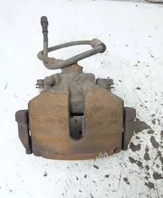 Volkswagen PASSAT B7 Front brake caliper