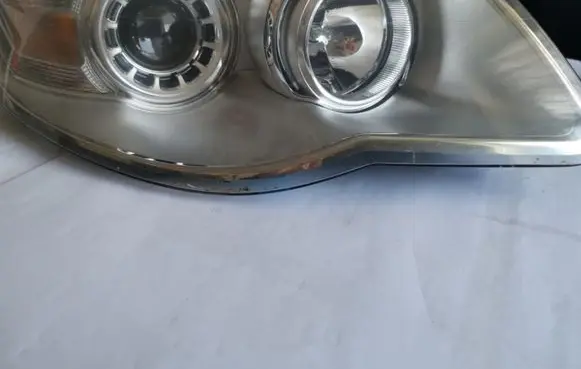 Volkswagen Touareg I Headlight/headlamp 7L6941032A 1LL24703204 24703204000010