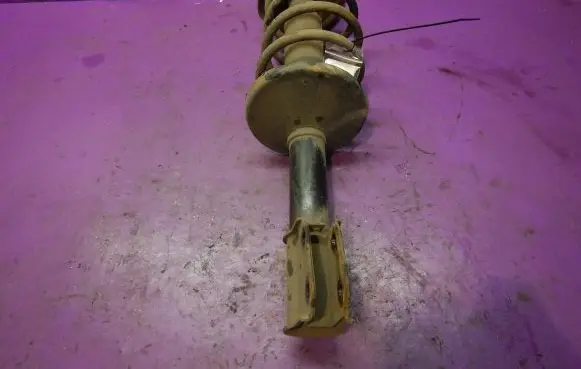 Front shock absorber with coil spring