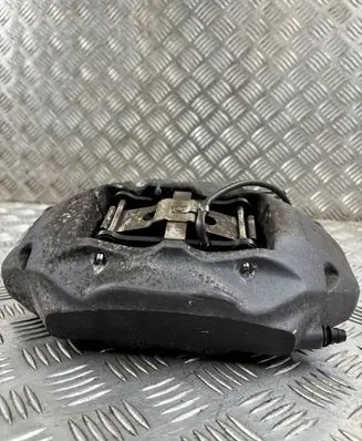 Volkswagen Touareg II Front brake caliper 7P6615105AE