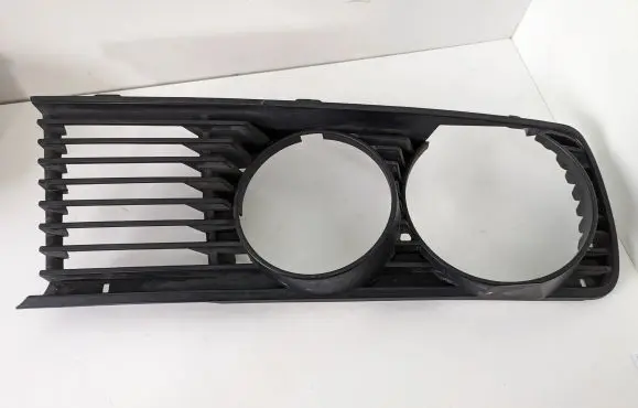 BMW 5 E28 Under headlight/headlamp trim 51131874645