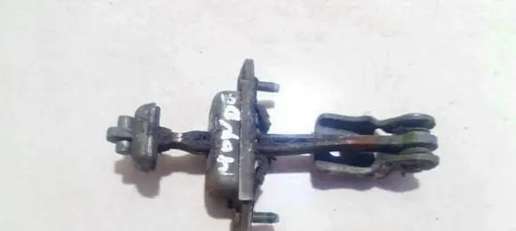 Ford Mondeo MK I Rear door check strap stopper