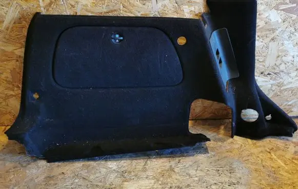 Trunk/boot lower side trim panel