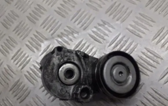 Opel Astra H Alternator belt tensioner pulley 