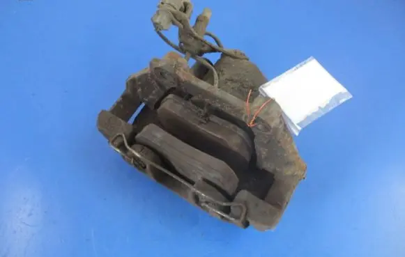 Volkswagen PASSAT B5 Front brake caliper