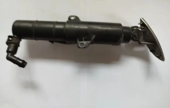Headlight washer spray nozzle