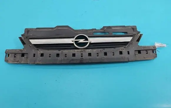 Opel Corsa C Front bumper upper radiator grill 499000099 IMPRK1517517