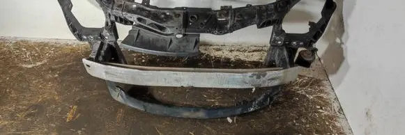 Radiator support slam panel