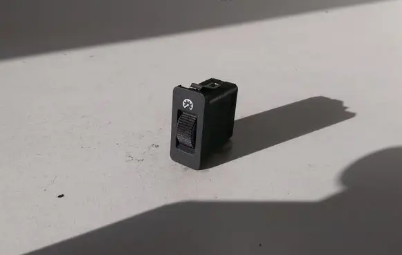 Panel lighting control switch