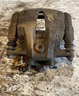 Opel Tigra B Front brake caliper 0876 72764 IU9