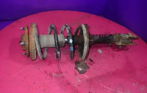 Mitsubishi Outlander Front shock absorber with coil spring