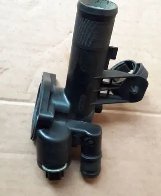 Thermostat/thermostat housing