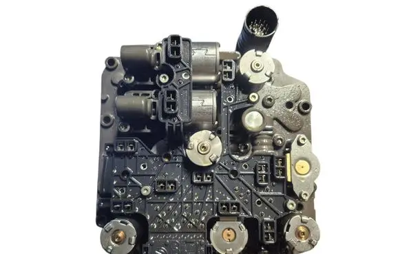 Volkswagen PASSAT B6 Transmission gearbox valve body 02E927770AE