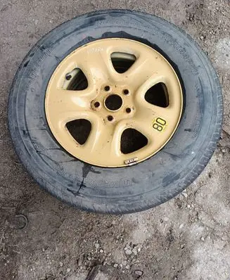 Suzuki Grand Vitara II R16 spare wheel N0CODE