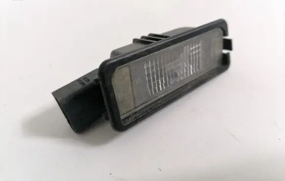 Volkswagen Golf VII Number plate light 1K8943021