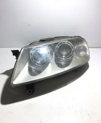 Volkswagen Touareg I Headlight/headlamp 7L6941015BK 89307851 1802A5394