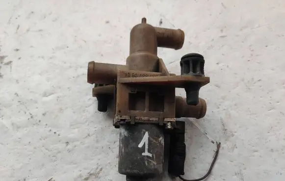 Coolant heater control valve
