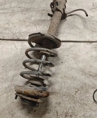 Nissan X-Trail T30 Rear shock absorber with coil spring