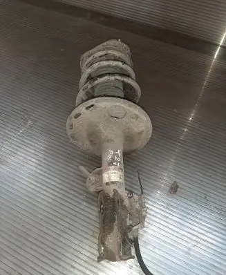 Toyota Avensis T270 Front shock absorber with coil spring 4852005330
