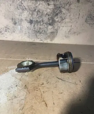 Piston with connecting rod