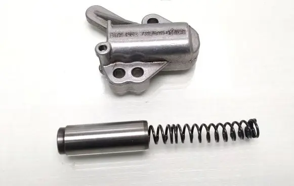 BMW X3 E83 Timing belt/chain tensioner 7797905 13527797905
