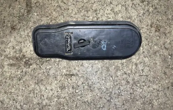 Tail light bulb cover holder