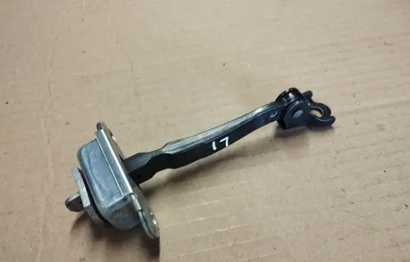 Nissan Note (E11) Front door check strap stopper