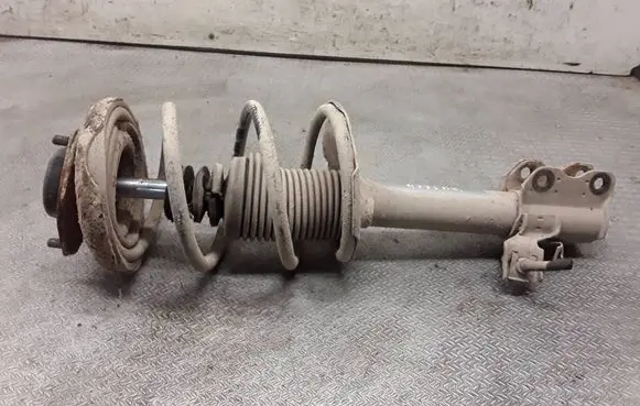 Nissan X-Trail T30 Front shock absorber with coil spring 