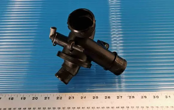 Thermostat/thermostat housing