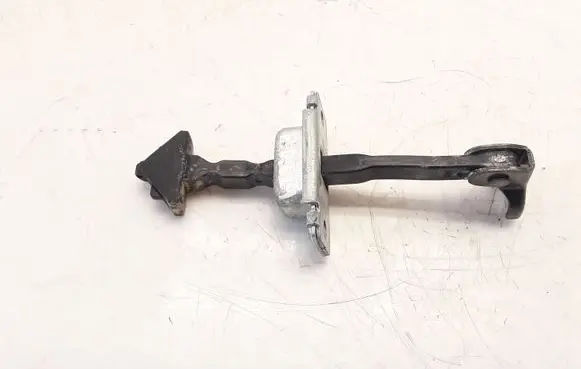 Front door check strap stopper