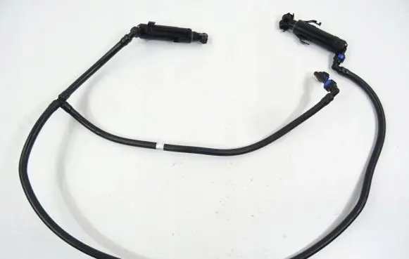 Volkswagen Touran III Windshield washer spray nozzle 1T0955103B