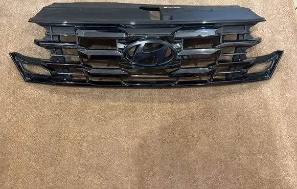 Hyundai Tucson IV NX4 Front bumper upper radiator grill 86391N7GA0