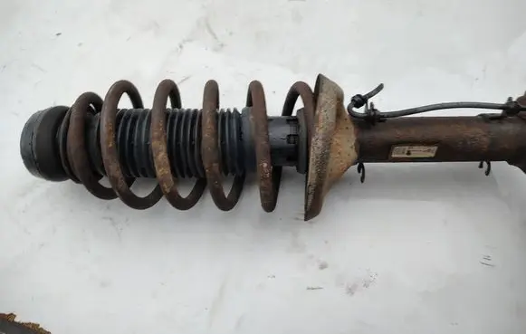 Volkswagen Golf IV Front shock absorber with coil spring