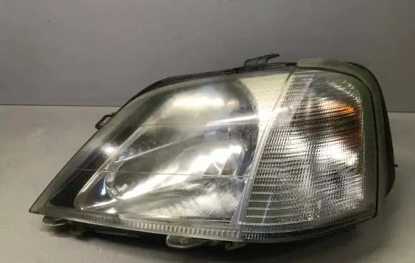 Dacia Logan I Headlight/headlamp 8200211005