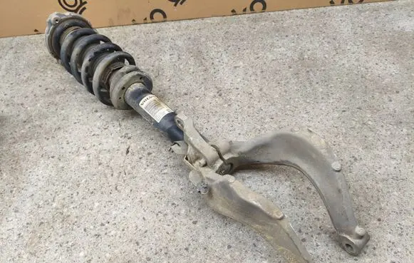 Volvo XC90 Front shock absorber with coil spring 31451830