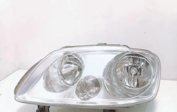 Volkswagen Touran I Headlight/headlamp 1270012379 125792006 010200