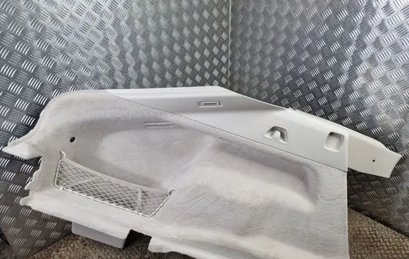 Trunk/boot lower side trim panel