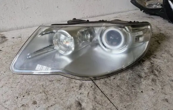 Volkswagen Touareg I Headlight/headlamp 7L6941031C 00945201252079 33370