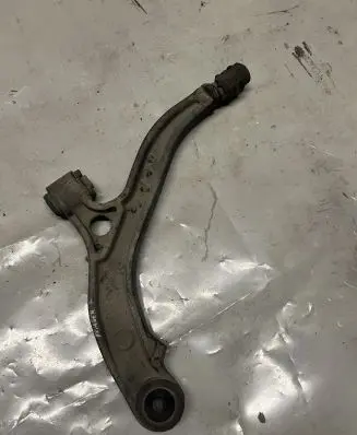Chrysler Grand Voyager IV Front lower control arm/wishbone 04694973AB