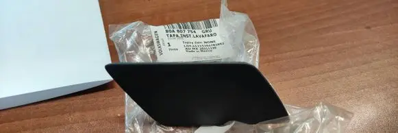 Headlight washer spray nozzle cap/cover