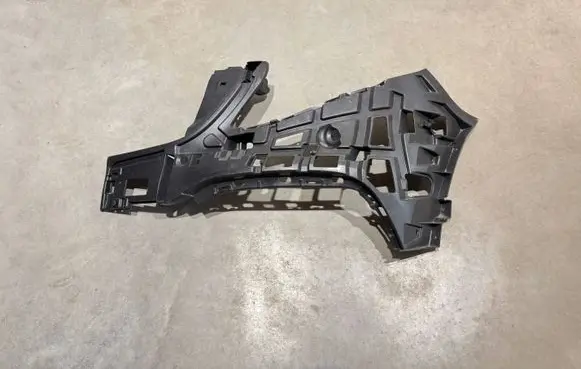 Front bumper mounting bracket