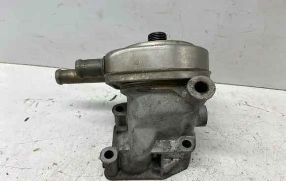 Mercedes-Benz 190 W201 Oil filter mounting bracket 1031802338 A1031802338 6740331590
