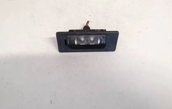 Volkswagen Touran II Number plate light 3af943021a