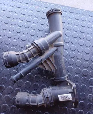 Thermostat/thermostat housing