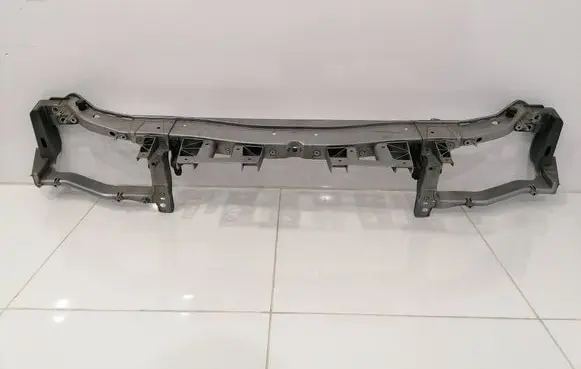 Top upper radiator support slam panel
