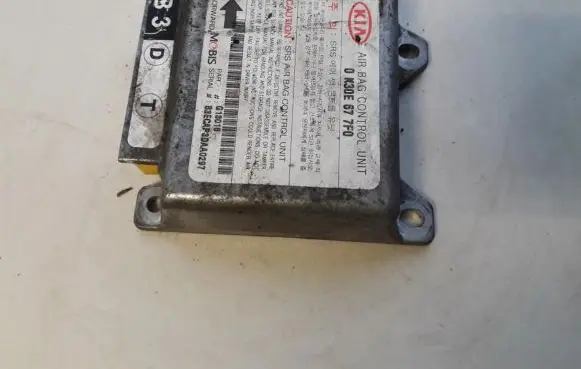 KIA Rio Airbag control unit/module 0K30E677F0 G13018