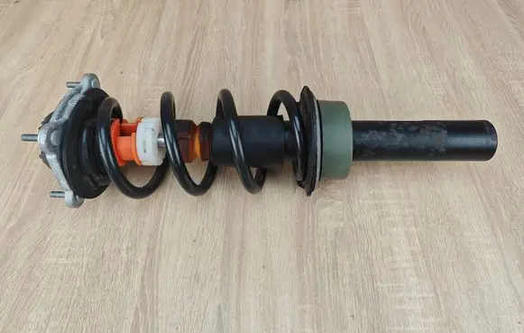 Front shock absorber with coil spring