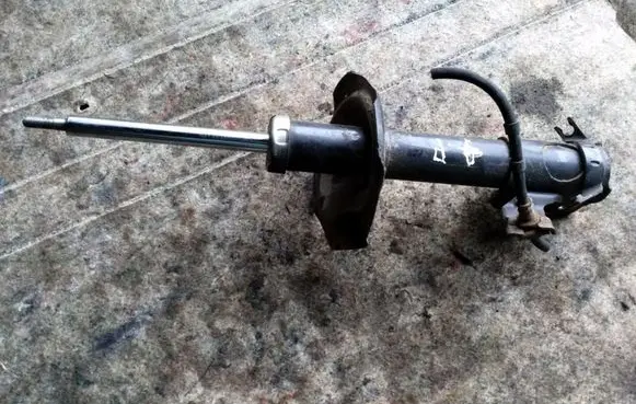 Nissan Almera Tino Front shock absorber/damper 423093JP