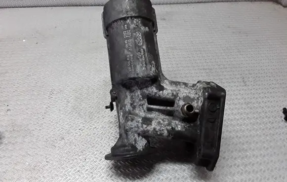 Volkswagen Sharan Oil filter mounting bracket 038115389C