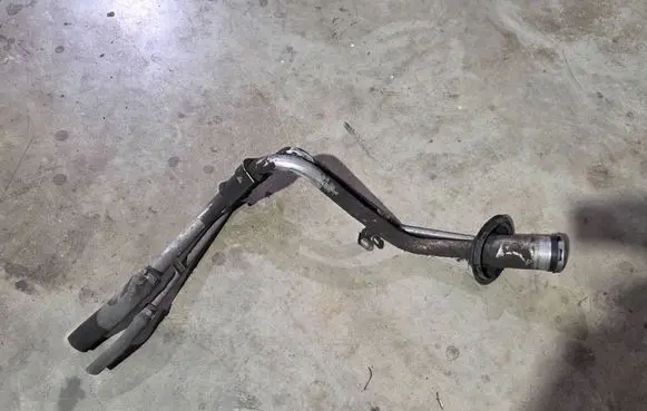 Fuel tank filler neck pipe
